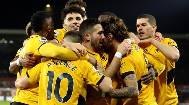 שחקני וולבס חוגגים (רויטרס) שחקני וולבס חוגגים