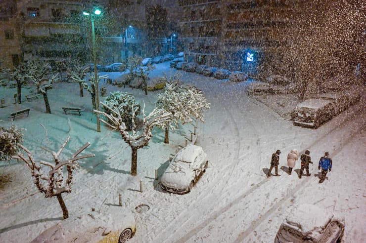 יוון אתונה סופה אלפיס משחקים ב שלג 