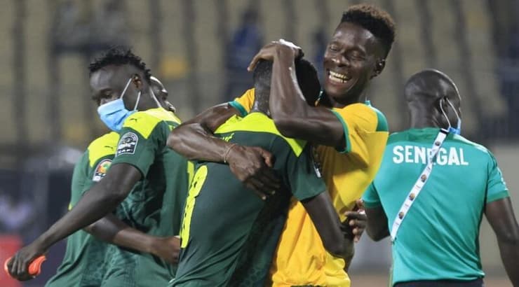 שחקני נבחרת סנגל חוגגים (רויטרס) שחקני נבחרת סנגל חוגגים