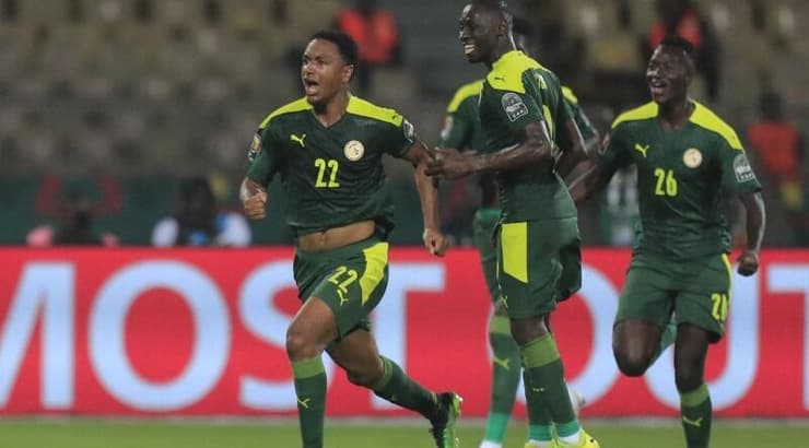 שחקני סנגל חוגגים (רויטרס) שחקני סנגל חוגגים