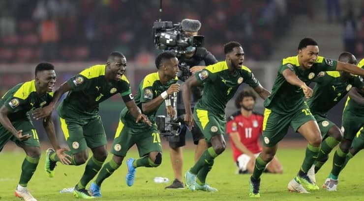 שחקני נבחרת סנגל חוגגים (רויטרס) שחקני נבחרת סנגל חוגגים