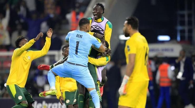 שחקני נבחרת סנגל חוגגים (רויטרס) שחקני נבחרת סנגל חוגגים