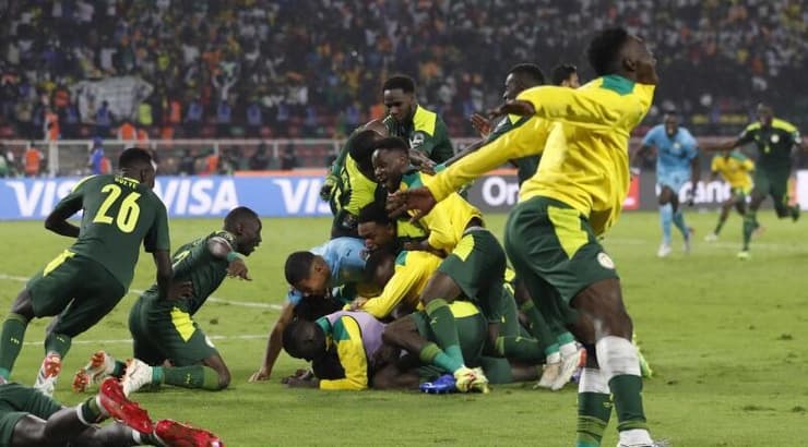 שחקני נבחרת סנגל חוגגים (רויטרס) שחקני נבחרת סנגל חוגגים