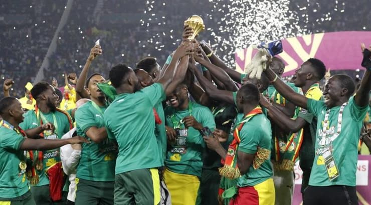 שחקני סנגל חוגגים זכייה (רויטרס) שחקני סנגל חוגגים זכייה