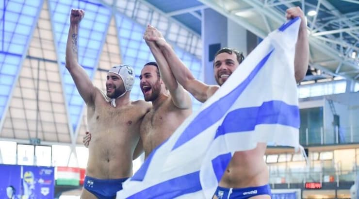 שחקני נבחרת ישראל בכדורמים חוגגים (חגי מיכאלי) שחקני נבחרת ישראל בכדורמים חוגגים