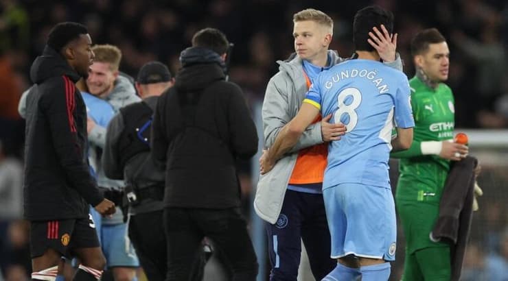 שחקני סיטי חוגגים בסיום (רויטרס) שחקני סיטי חוגגים בסיום