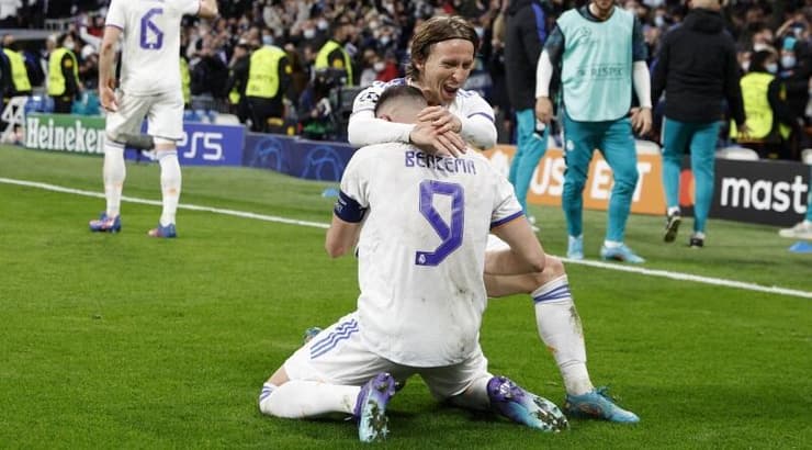 קארים בנזמה ולוקה מודריץ' בטירוף (רויטרס) קארים בנזמה ולוקה מודריץ' בטירוף