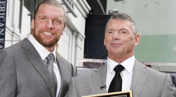 וינס מקמהון וטריפל אייץ' (רויטרס) וינס מקמהון וטריפל אייץ'