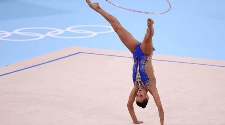 התחיל הפוך. לינוי אשרם עם החישוק שברח בטוקיו