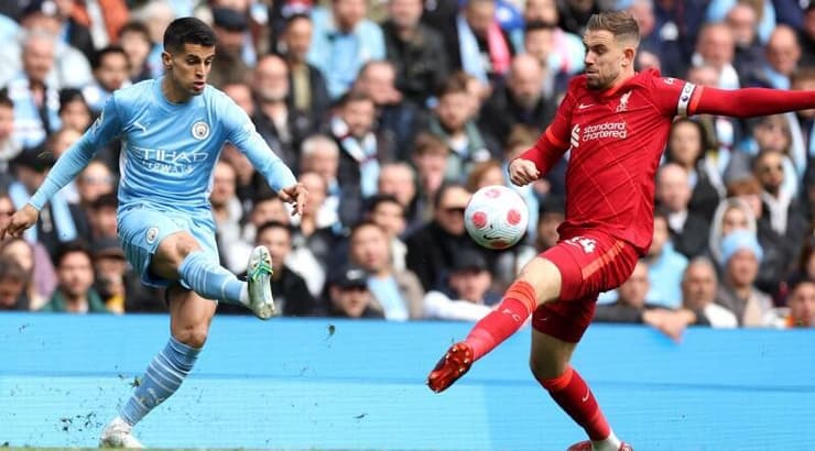 ז'ואאו קנסלו מול ג'ורדן הנדרסון (רויטרס) ז'ואאו קנסלו מול ג'ורדן הנדרסון