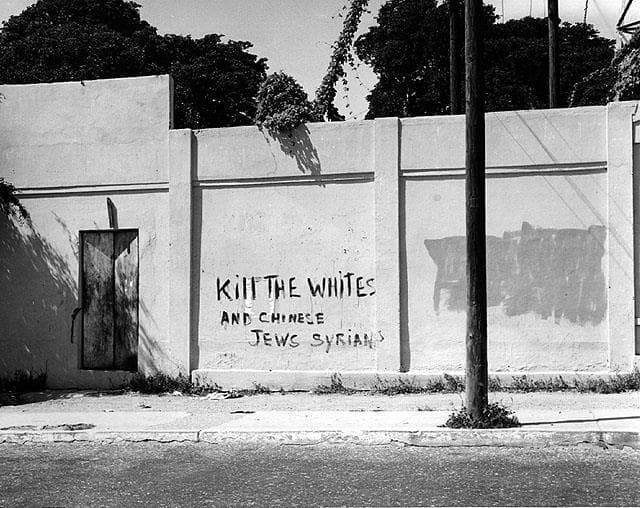 כתובת נגד מיעוטים (לבנים, סינים, יהודים וסורים) בג'מייקה, 1970