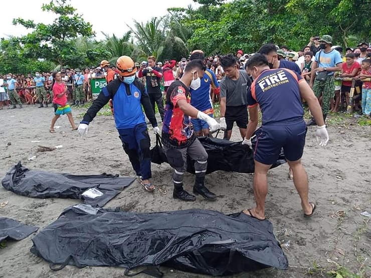 פיליפינים הפיליפינים הצפות שיטפונות סופה מגי הרוגים
