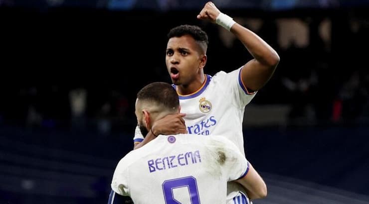 רודריגו וקארים בנזמה חוגגים (רויטרס) רודריגו וקארים בנזמה חוגגים