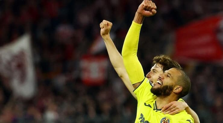 אטיין קאפו ופאו טורס חוגגים (רויטרס) אטיין קאפו ופאו טורס חוגגים