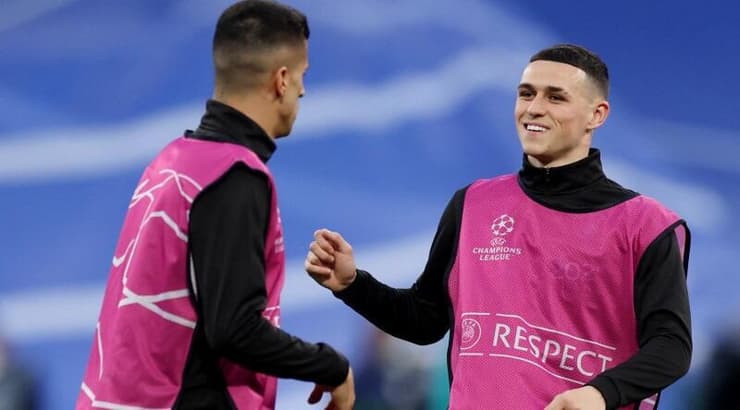 פיל פודן וז'ואאו קאנסלו בחימום (רויטרס) פיל פודן וז'ואאו קאנסלו בחימום