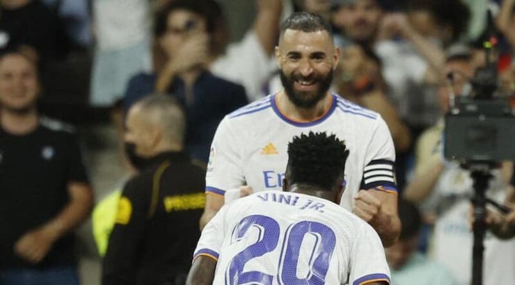 ויניסיוס ג'וניור וקארים בנזמה חוגגים (רויטרס) ויניסיוס ג'וניור וקארים בנזמה חוגגים