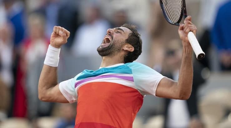 מארין צ'יליץ' חוגג (רויטרס) מארין צ'יליץ' חוגג