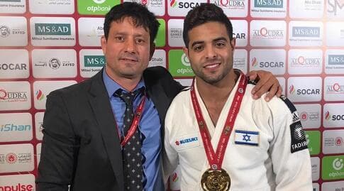 שגיא מוקי ואורן סמדג'ה עם המדליה באבו דאבי
