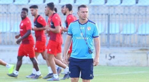 ברק בכר ושחקני הפועל באר שבע באימון