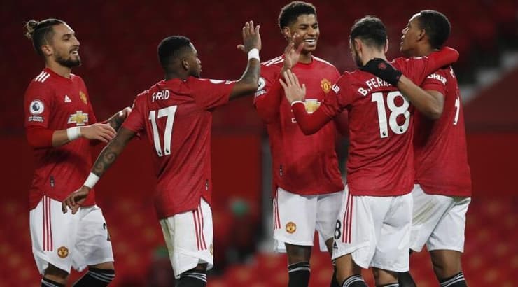 שחקני מנצ'סטר יונייטד חוגגים