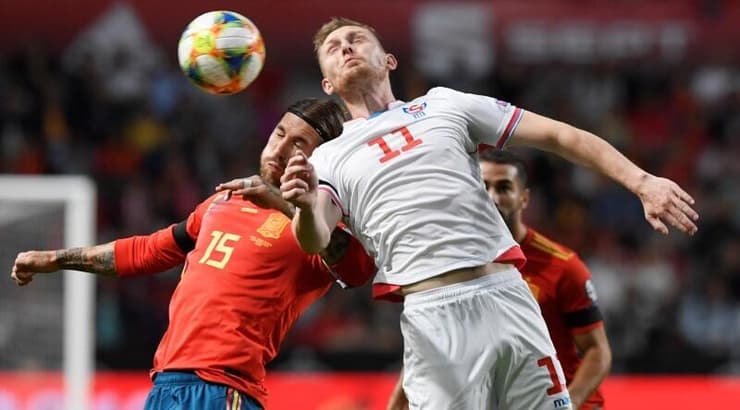 קלמיט אולסן וסרחיו ראמוס (רויטרס) קלמיט אולסן וסרחיו ראמוס