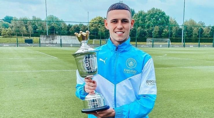 פיל פודן עם התואר