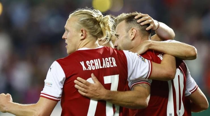 שחקני נבחרת אוסטריה חוגגים (רויטרס) שחקני נבחרת אוסטריה חוגגים