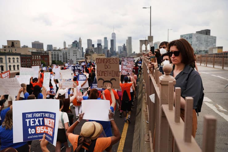 הפגנה מפגינים בארה"ב ניו יורק שינוי חוקי ה נשק