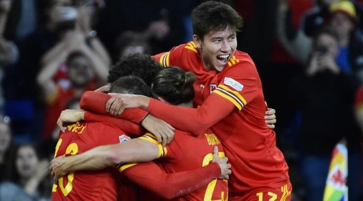 שחקני וויילס חוגגים (רויטרס) שחקני וויילס חוגגים