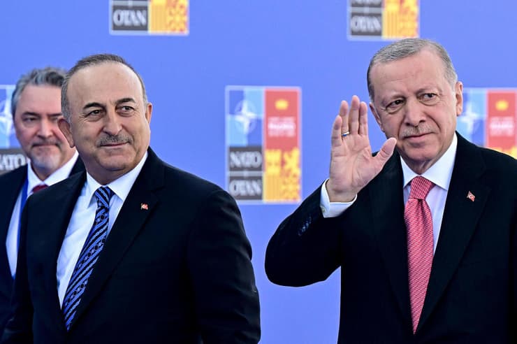 רג'פ טאיפ ארדואן ושר החוץ של טורקיה מבלוט צ'בושולו פסגת נאט"ו מדריד