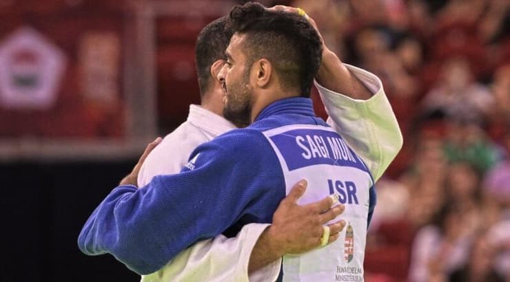 שגיא מוקי וסעיד מולאי מחובקים (באדיבות איגוד הג'ודו העולמי) שגיא מוקי וסעיד מולאי מחובקים