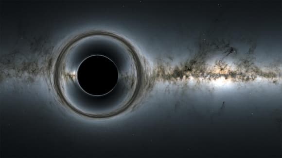 הדמיה של חור שחור מעוות את מראה הכוכבים ברקע 