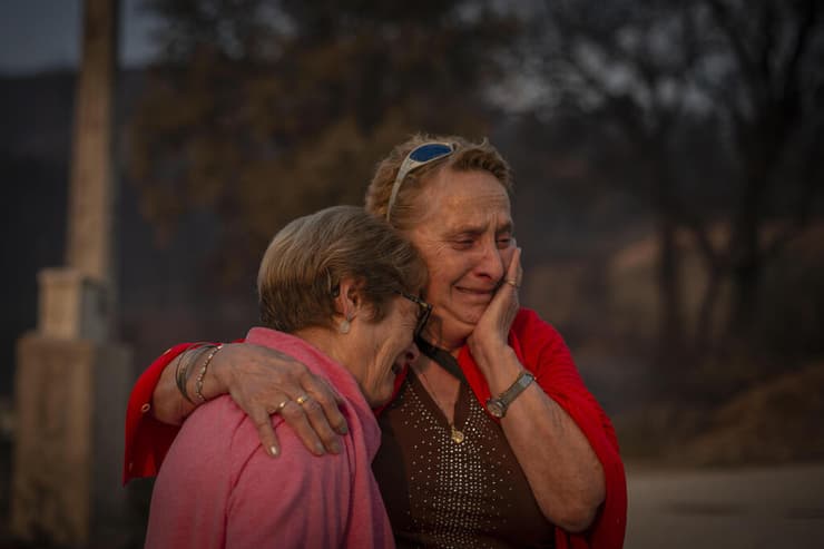 גל חום ספרד שרפה תושבות בוכות