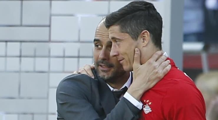 רוברט לבנדובסקי ופפ גווארדיולה (רויטרס) רוברט לבנדובסקי ופפ גווארדיולה