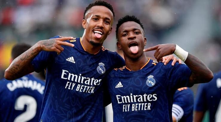 אדר מיליטאו ו-ויניסיוס (רויטרס) אדר מיליטאו ו-ויניסיוס