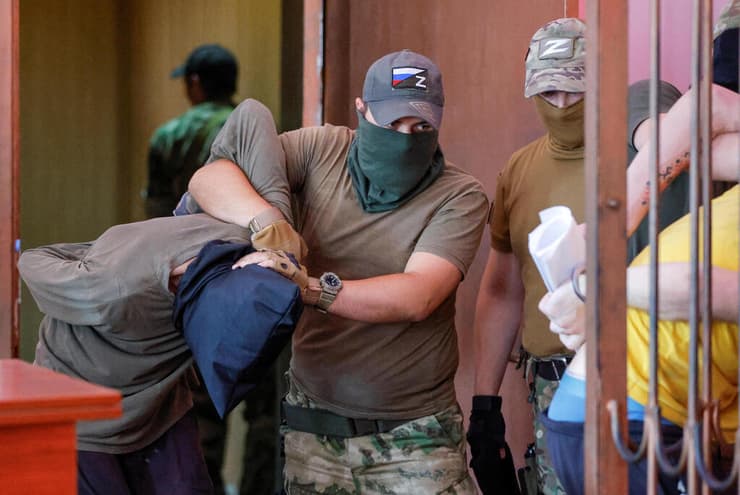 דונייצק מזרח אוקראינה משפט של זרים שהתנדבו לצבא האוקראיני ונפלו בשבי הרוסי עומדים לדין