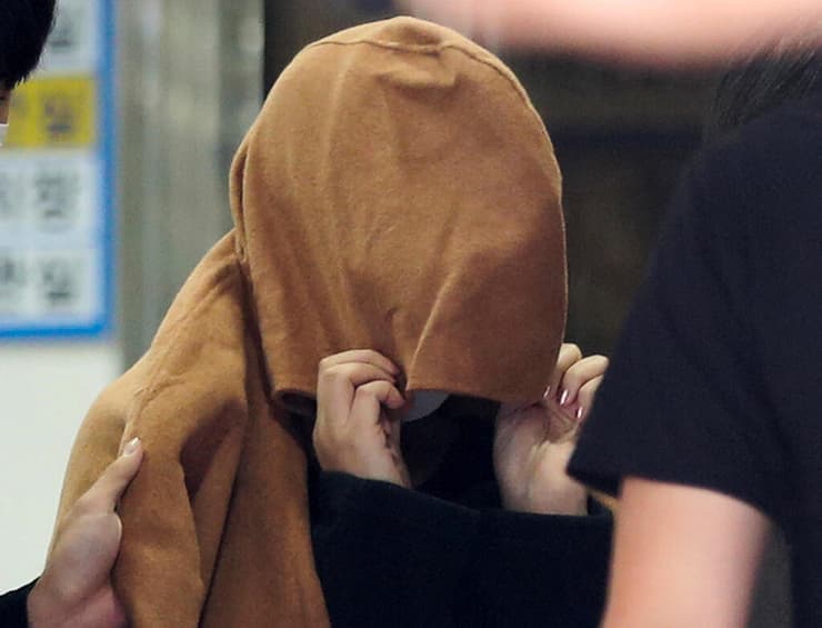 דרום קוריאה נעצרה אם בחשד שרצחה את ילדיה ב ניו זילנד פרשת הגופות במזוודות