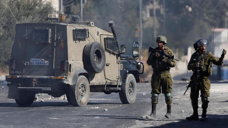 "הם שומרים עלינו - ומחובתנו לשמור עליהם". מבקר המדינה על החיילים (צילום: רויטרס) עימותים ביהודה ושומרון