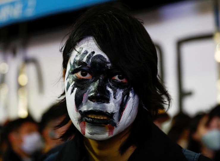 הפגנת הזדהות עם מחאה הפגנות נגד הגבלות קורונה ב סין  ב טוקיו יפן