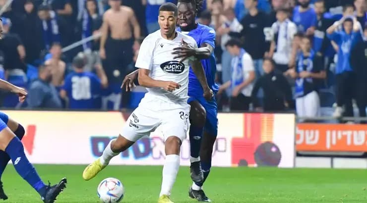 עידן טוקלומטי בועט