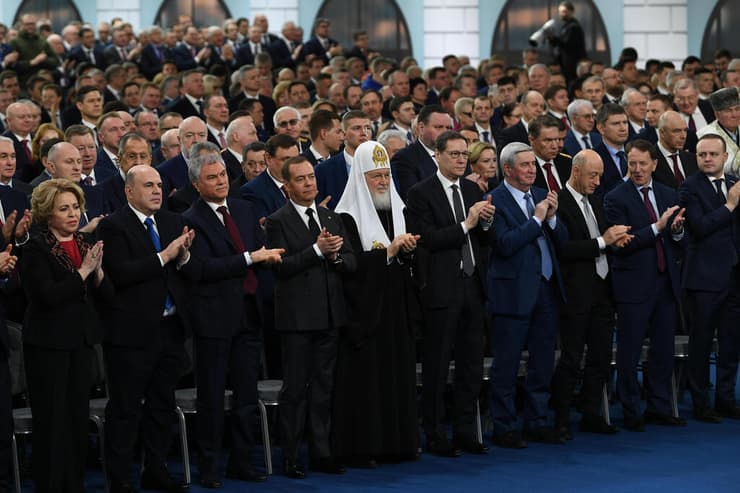בכירי המשטר ב רוסיה צופים בנאומו של ולדימיר פוטין לקראת ציון שנה ל מלחמה מול אוקראינה