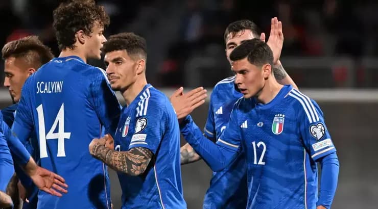 שחקני איטליה חוגגים (רויטרס) שחקני איטליה חוגגים