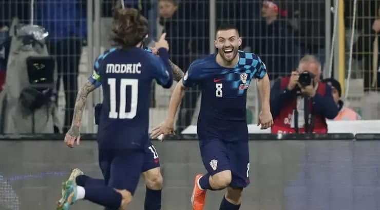 שחקני קרואטיה חוגגים (רויטרס) שחקני קרואטיה חוגגים