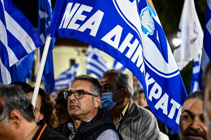 יוון בחירות עצרת של תומכי מפלגת הדמוקרטיה החדשה ו ראש הממשלה קיריאקוס מיצוטקיס
