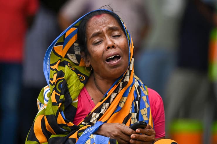 הודו אסון רכבת רכבות ב אודישה קרובה של אחד ההרוגים בוכה