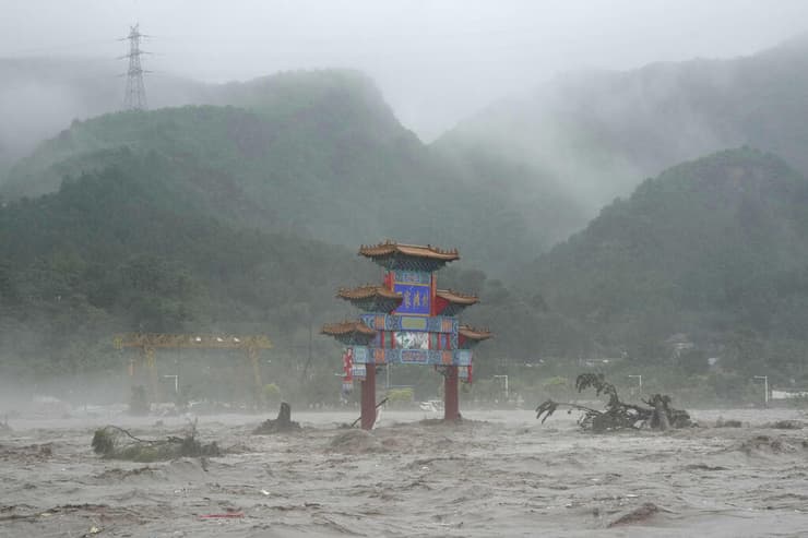 הצפות שיטפונות סופה סופת טייפון בייג'ינג צפון סין