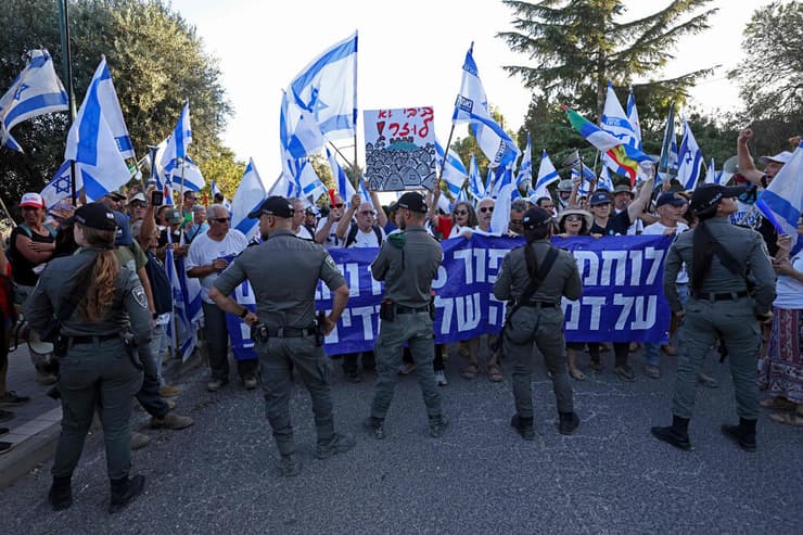 צילום: JALAA MAREY/AFP מחאה בנווה אטי"ב