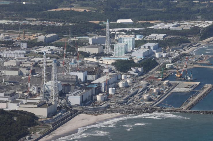 יפן מתקן ה גרעין פוקושימה ב יום התחלת הזרמת המים הרדיואקטיביים ל אוקיינוס