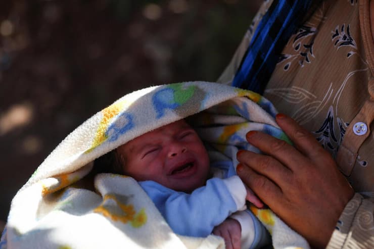 מרוקו כילתום ובנה בן 15 יום שנולד ימים אחרי רעידת אדמה שרדו בכפר תינמל