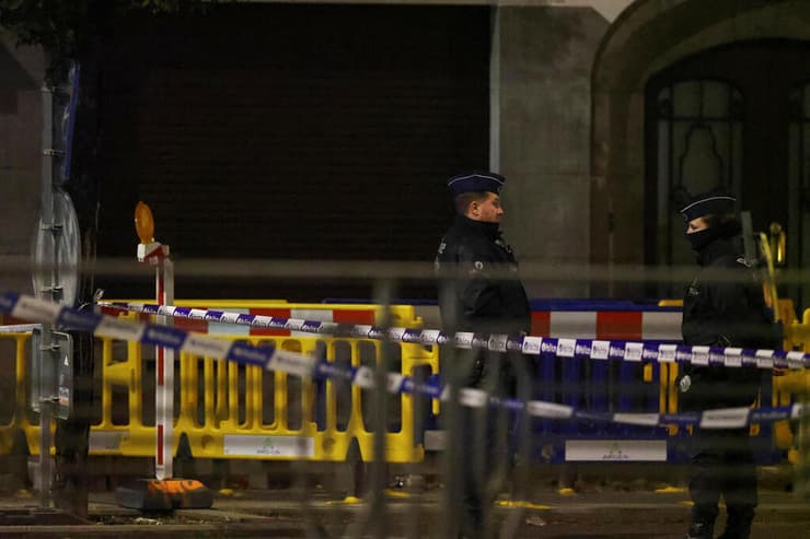 בלגיה בריסל חשד ל פיגוע נרצחו שני אוהדי נבחרת שבדיה